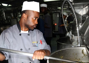Preparing crew's Thanksgiving dinner aboard USS Monterey