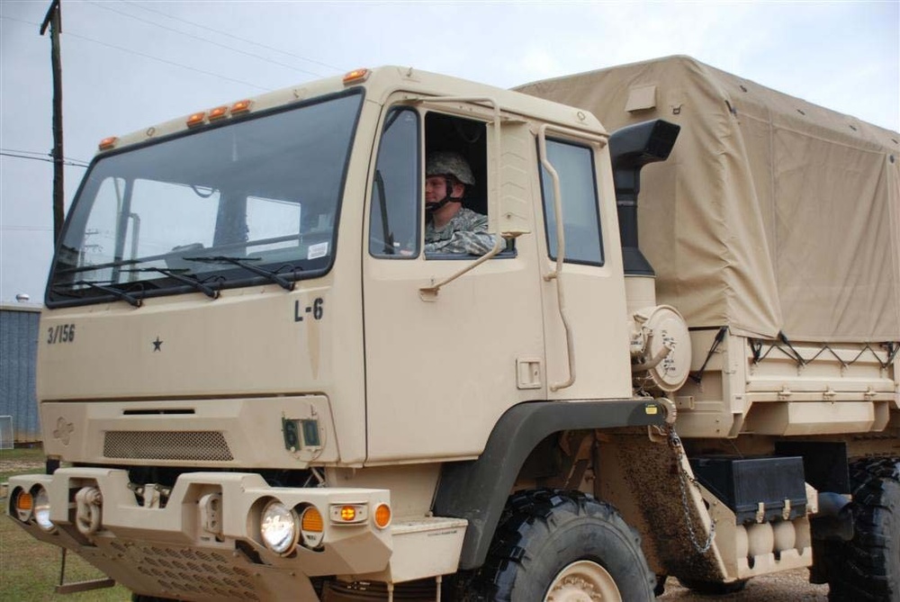 National Guard trucks in new year at Camp Minden