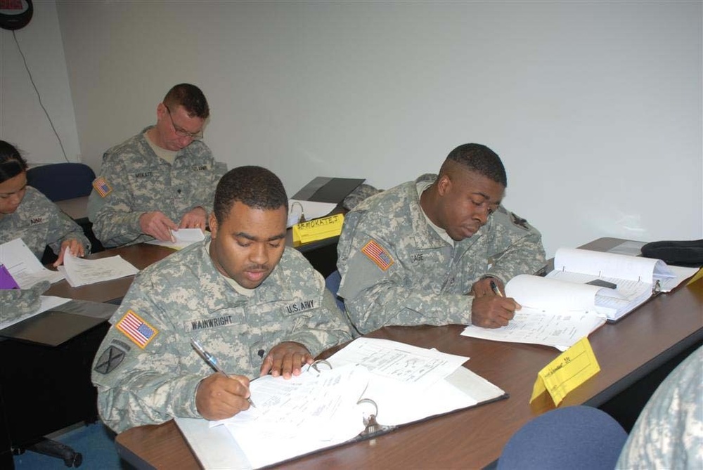 National Guard trucks in new year at Camp Minden