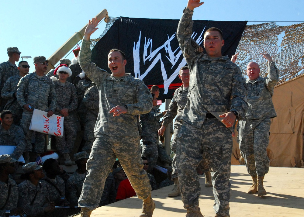 Multi-National Division - Baghdad, 4th Infantry Division Soldiers reenlist during World Wrestling Entertainment's Salute the Troops Tour