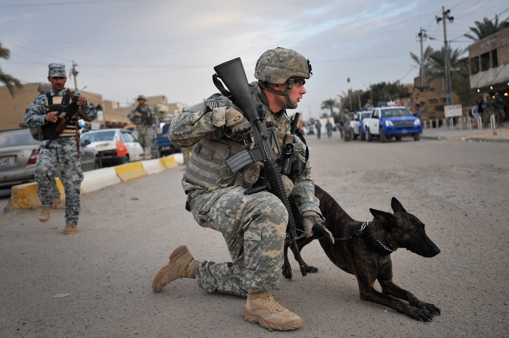 Raider Dog Team Conducts Combined Patrol With Soldiers, National Polices