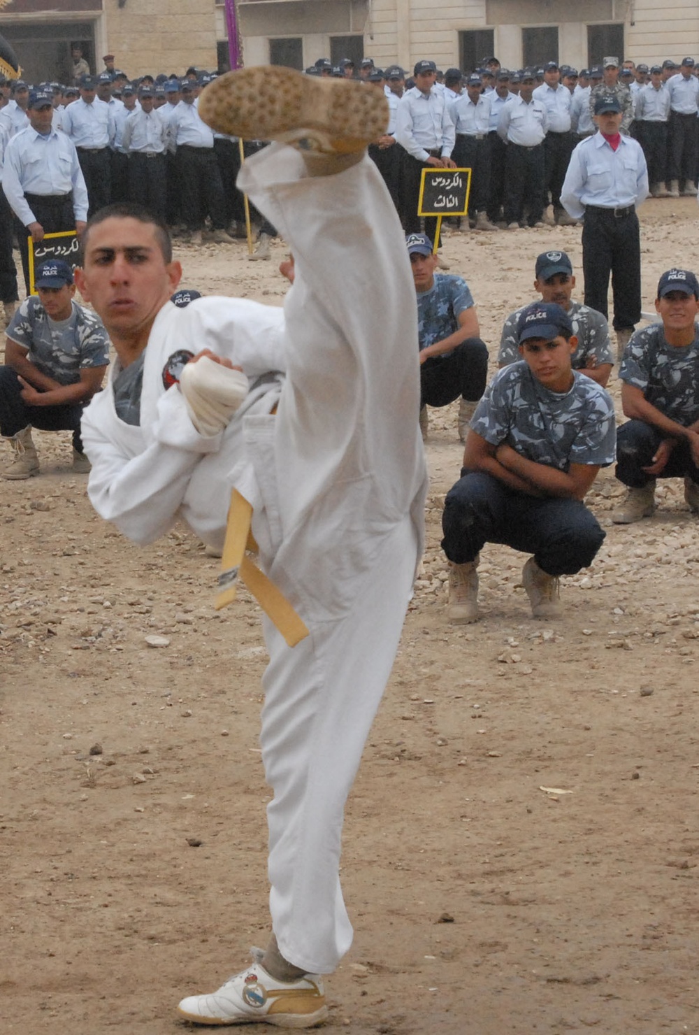 Sons of Iraq transition to Iraqi Polices during Furat Iraqi Police Graduation Ceremony