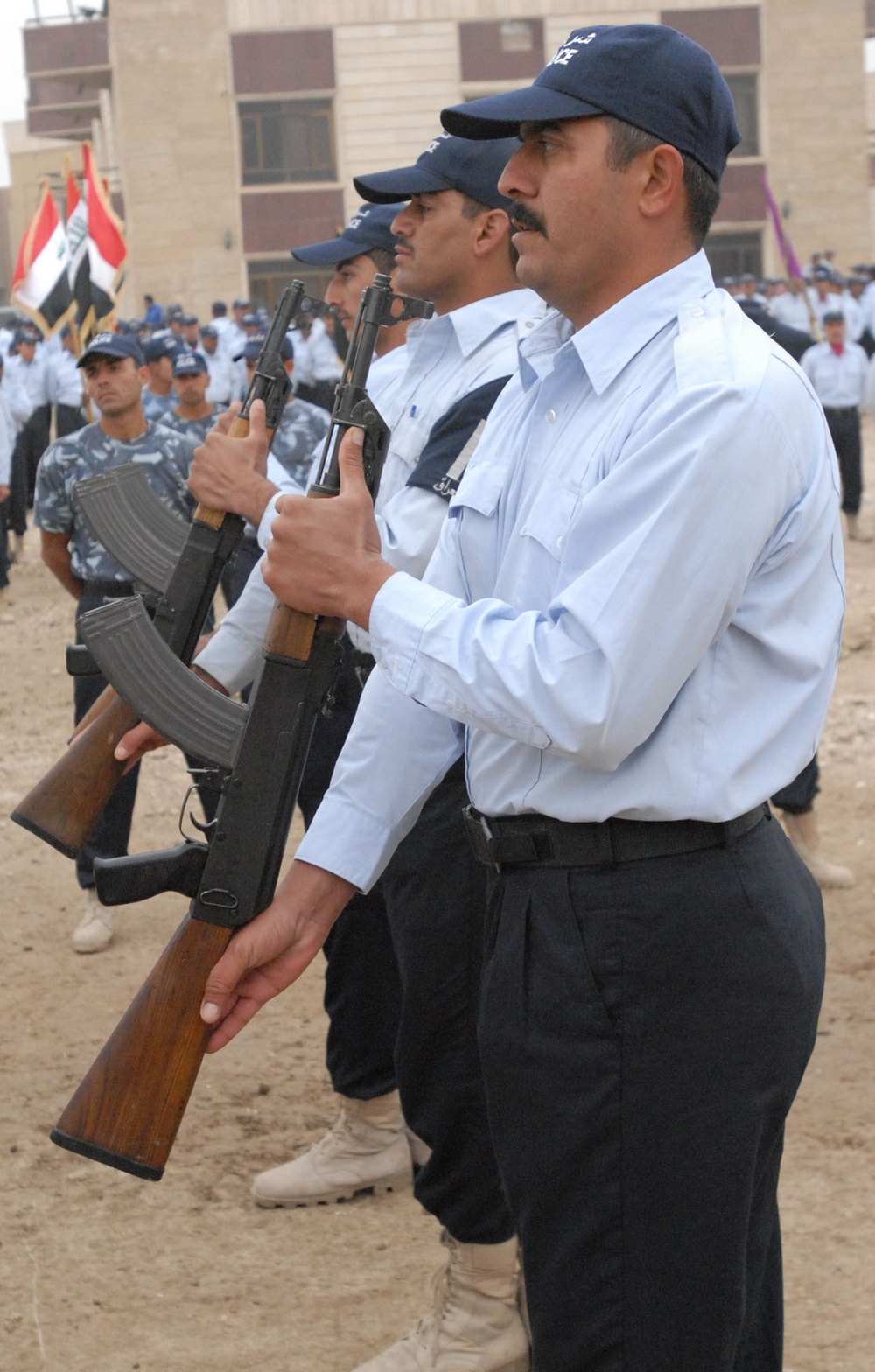 Sons of Iraq transition to Iraqi Polices during Furat Iraqi Police Graduation Ceremony