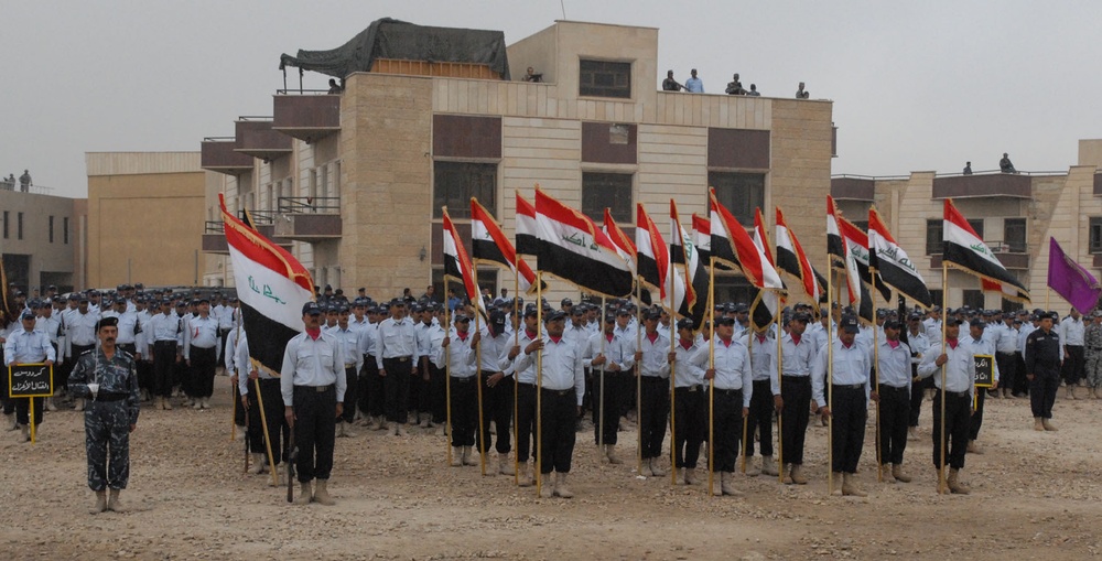 Sons of Iraq transition to Iraqi Polices during Furat Iraqi Police Graduation Ceremony