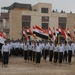 Sons of Iraq transition to Iraqi Polices during Furat Iraqi Police Graduation Ceremony