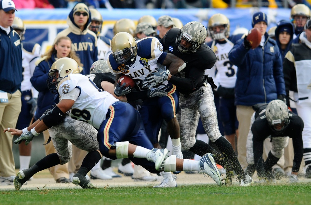 Running for extra yardage against Army