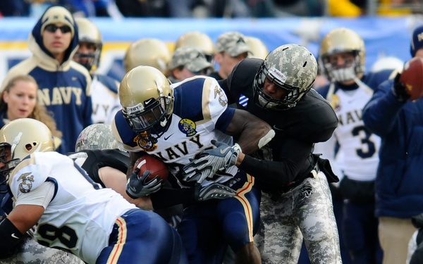 Running for extra yardage against Army