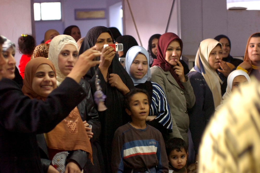 100 Iraqi women graduate adult literacy course in eastern Baghdad