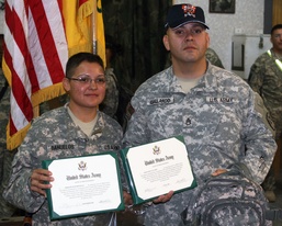 Sister, brother reenlist at Camp Striker