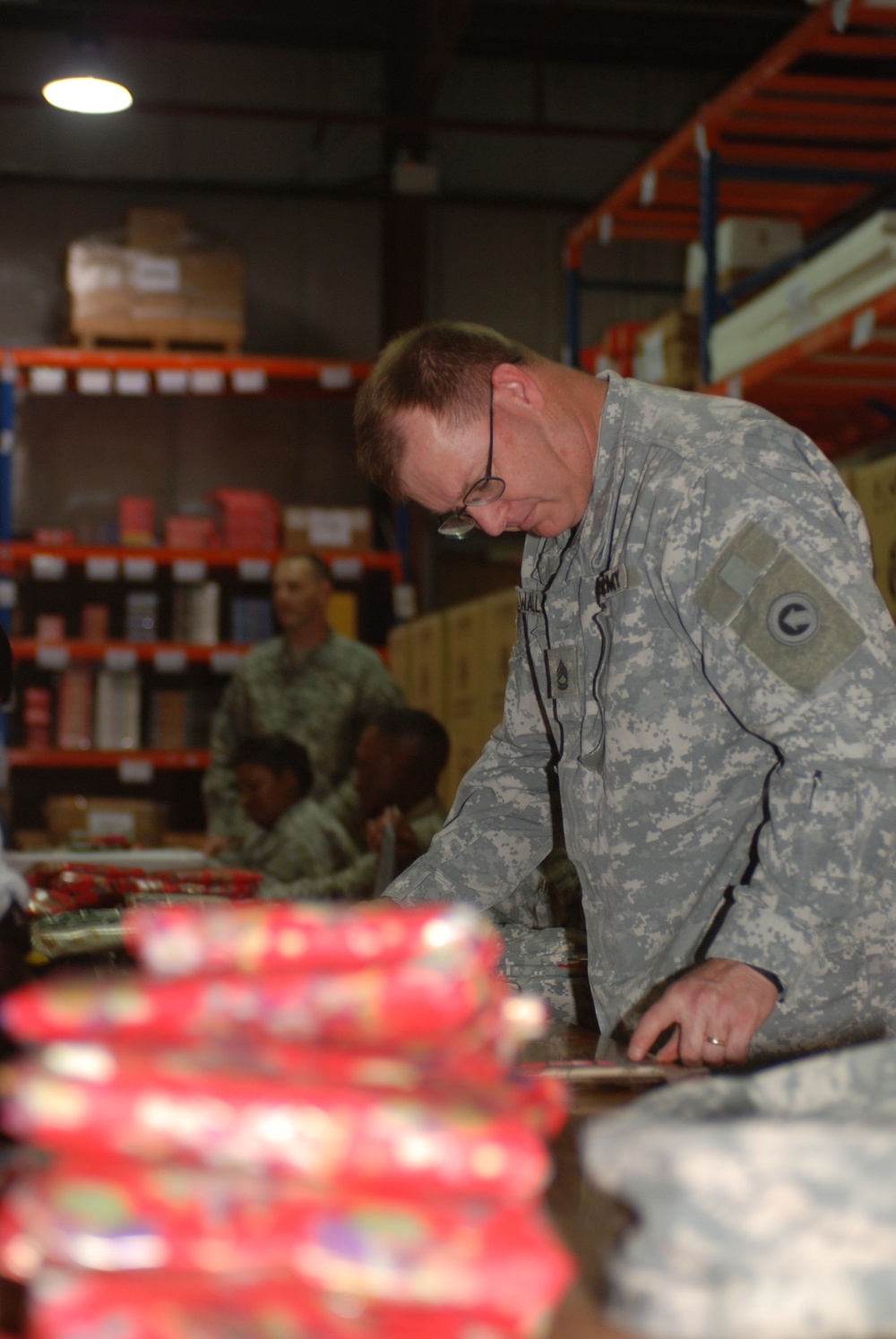 1st Sustainment Command Wraps Gifts