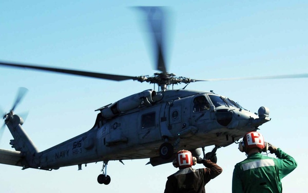 Work aboard the USS Theodore Roosevelt