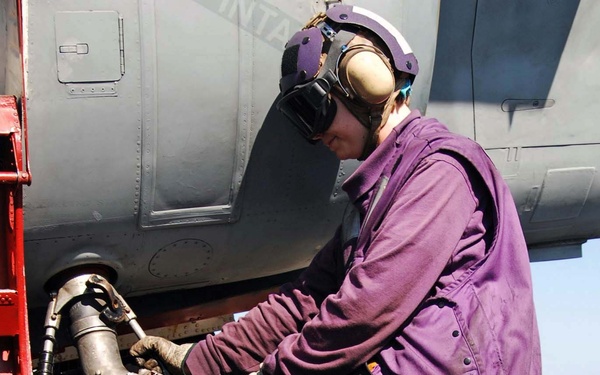 Work aboard the USS Theodore Roosevelt