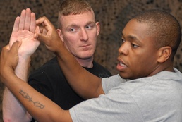 Strikers learn combatives