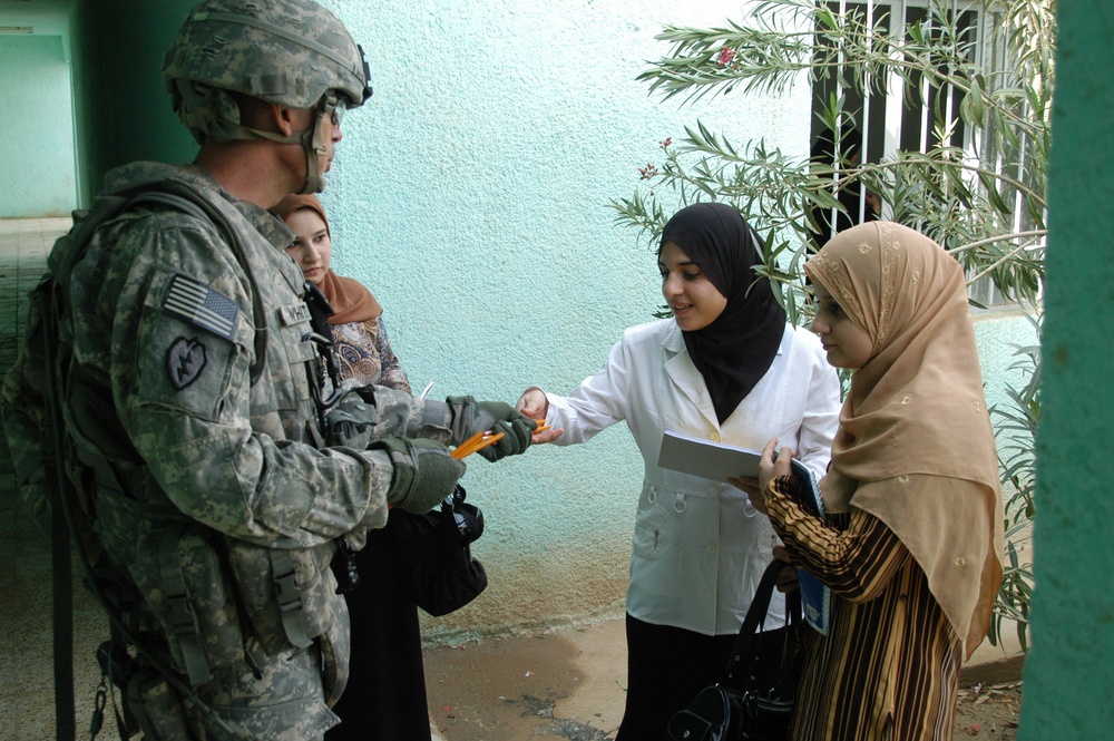 Multi-National Division - Baghdad Soldier, famous actress joins forces