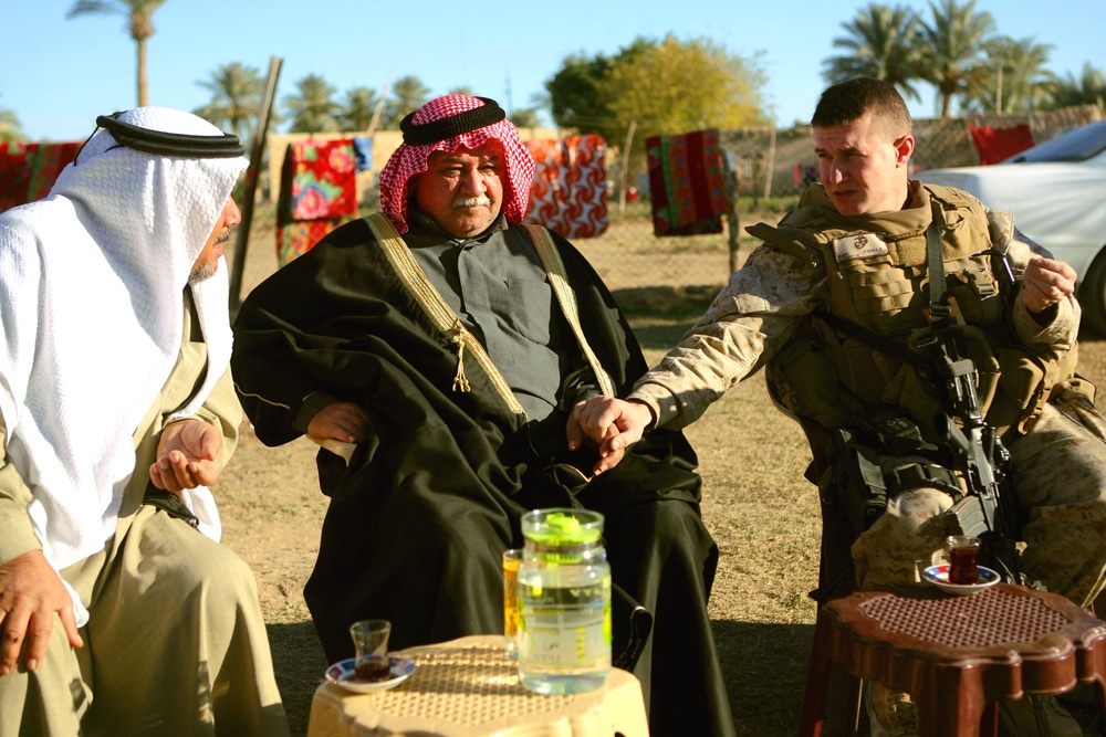 Suspect in death of Iraqi policeman detained; Marines, IPs visit family