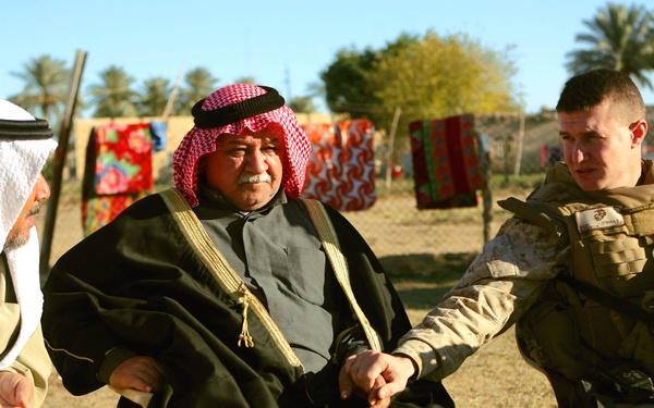 Suspect in death of Iraqi policeman detained; Marines, IPs visit family