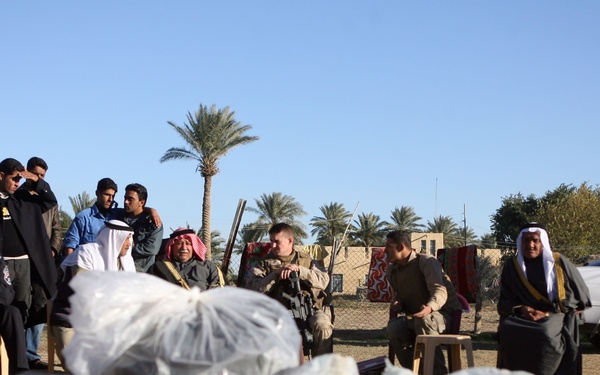 Suspect in death of Iraqi policeman detained; Marines, IPs visit family