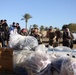Suspect in death of Iraqi policeman detained; Marines, IPs visit family
