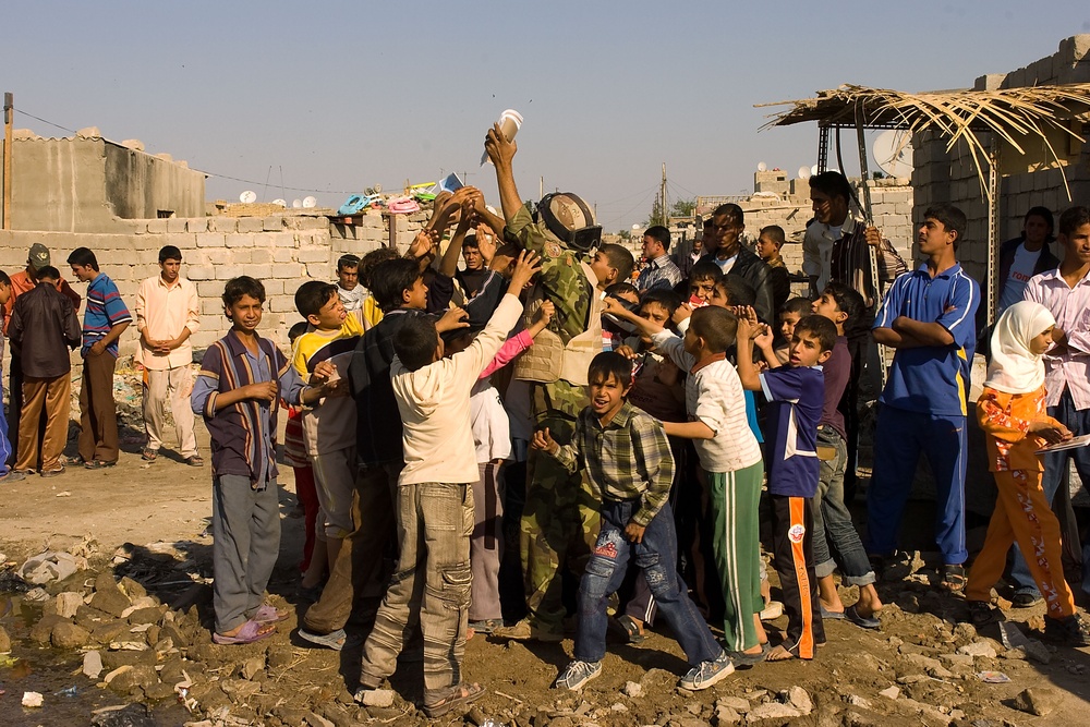 Iraqi army distributes heaters, clothing in Basra