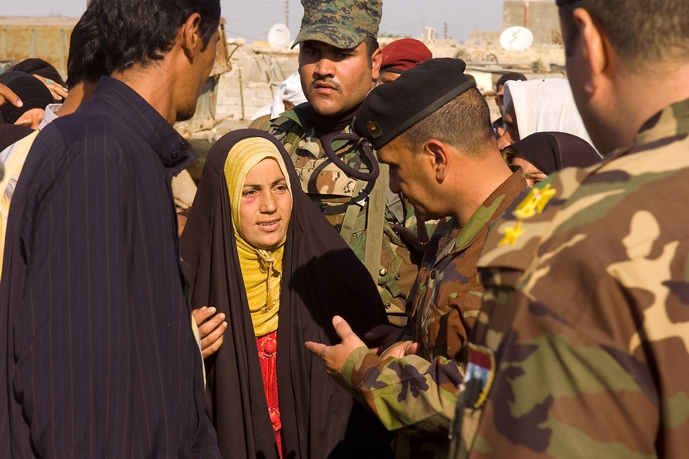 Iraqi army distributes heaters, clothing in Basra
