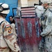 Iraqi Security Forces, Multi-National Division - Baghdad Soldiers patrols the neighborhood of Abu Ghuraib