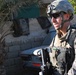 Iraqi Security Forces, Multi-National Division - Baghdad Soldiers patrols the neighborhood of Abu Ghuraib