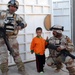 Iraqi Security Forces, Multi-National Division - Baghdad Soldiers patrols the neighborhood of Abu Ghuraib