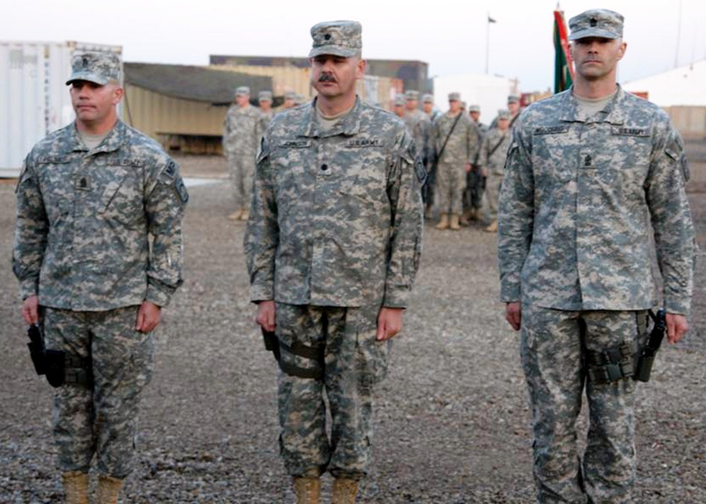 716th Military Police Battalion Command Sergeant Major hands over reins during ceremony