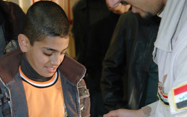 Kut orphans' need for safe haven captures attention of Al Kut Special Weapons and Tactics