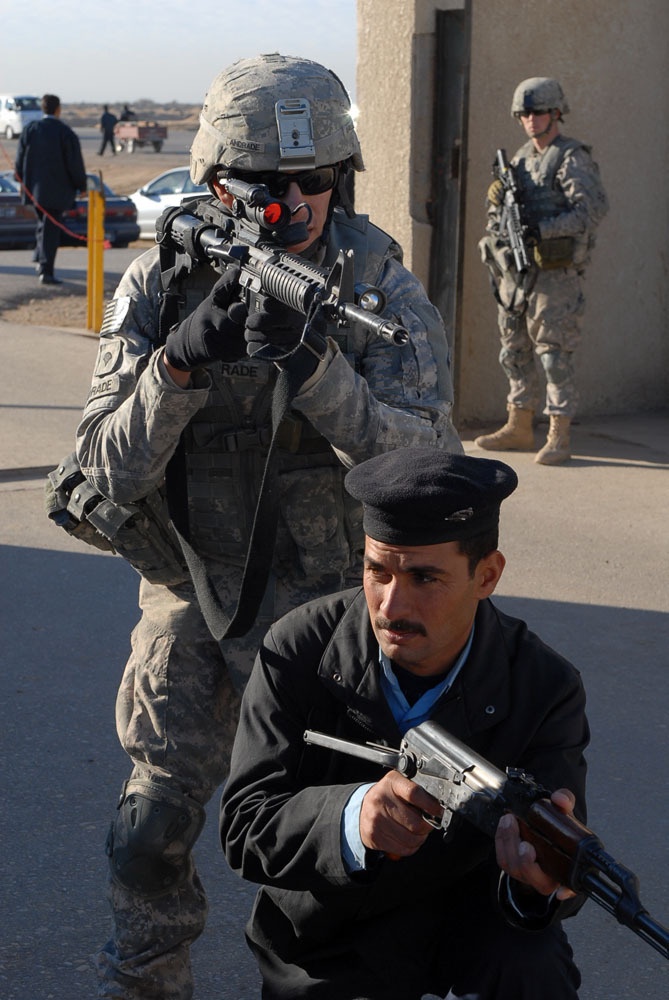 Dragoon Co., Iraqi highway patrol conduct information exchange