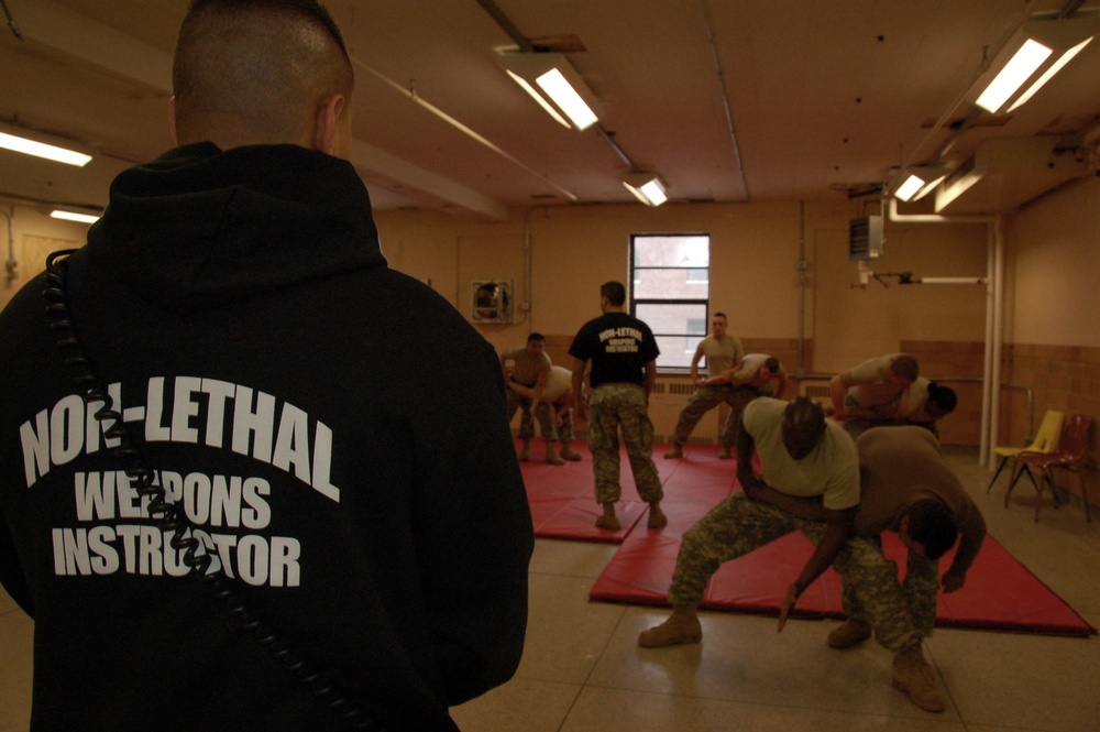 Weapons training focuses less on combat, more on control, compliance