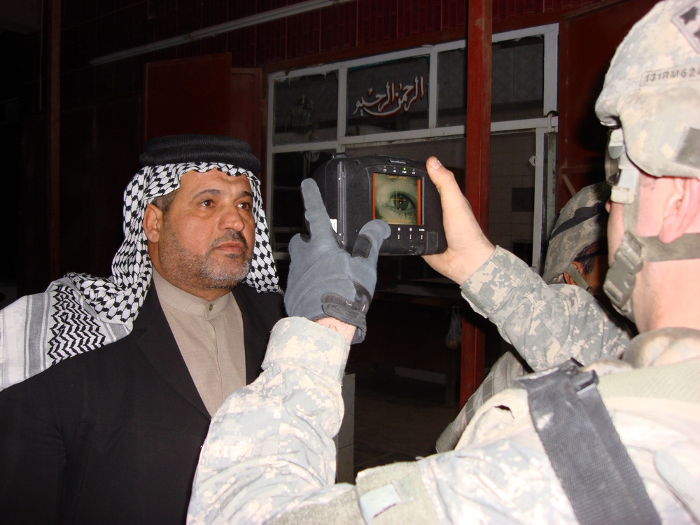 Soldiers use biometric technology to compile personal data