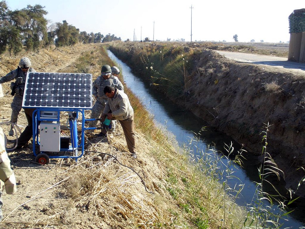 Multi-National Division- Baghdad Soldiers bring clean water to rural villages in Mahmudiyah