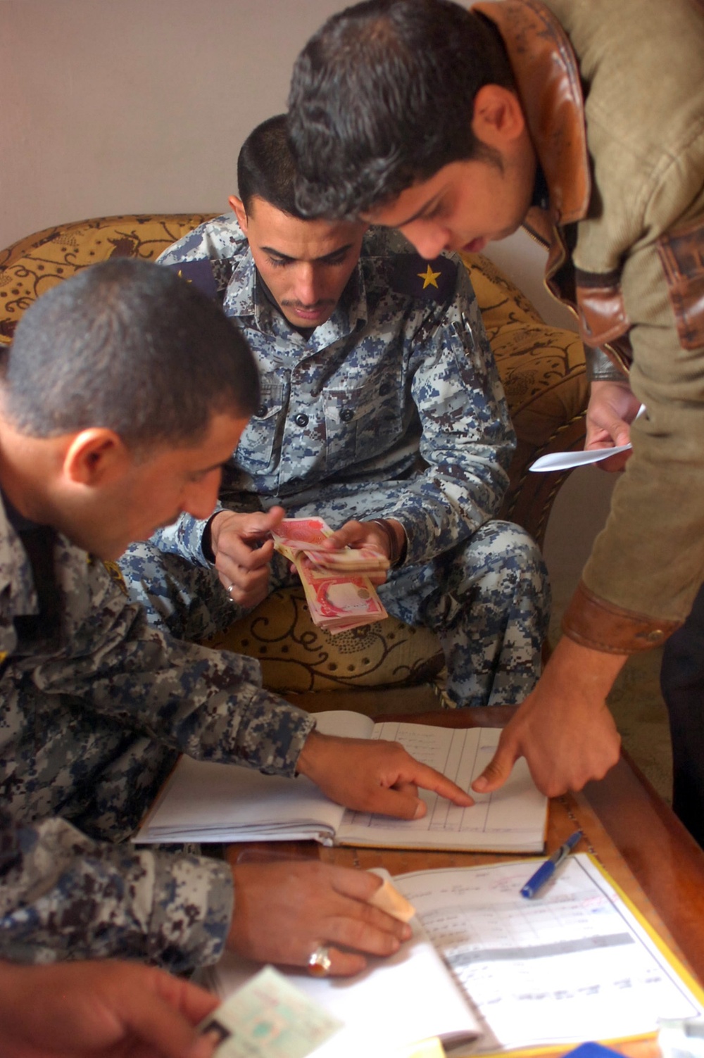 Government of Iraq payments to Sons, Daughters of Iraq in New Baghdad = success