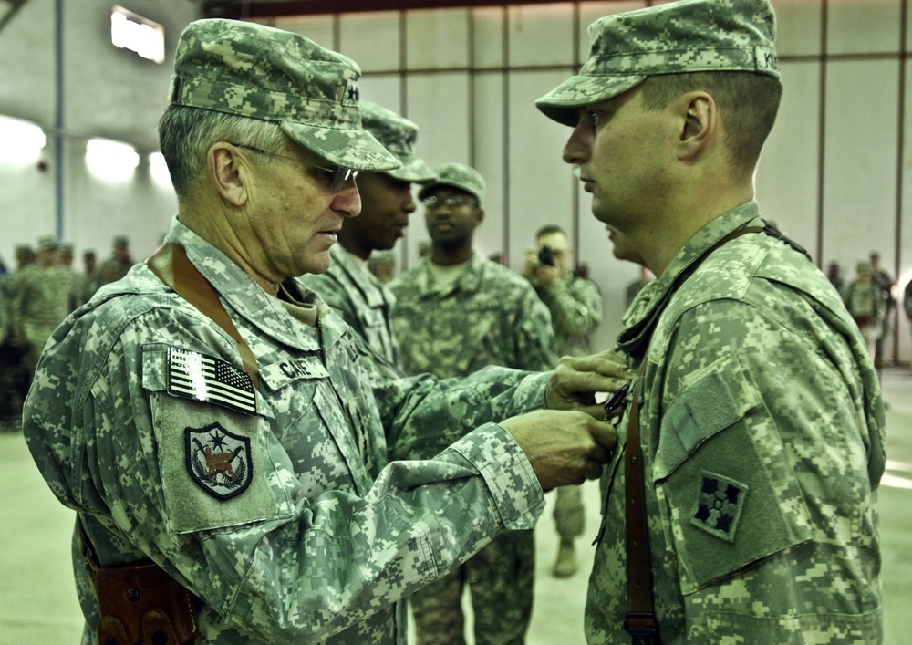 Casey visits aviation Soldiers, presents awards, reenlists 50 'Iron Eagle' Soldiers
