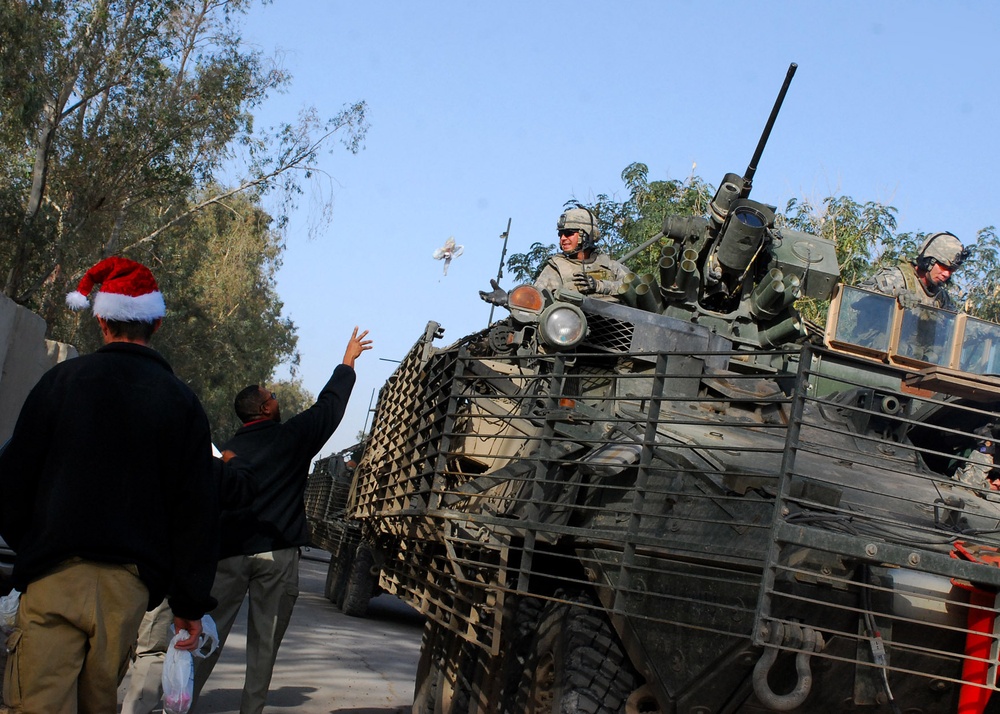 Contractors give back to Multi-National Division - Baghdad Soldiers on Christmas