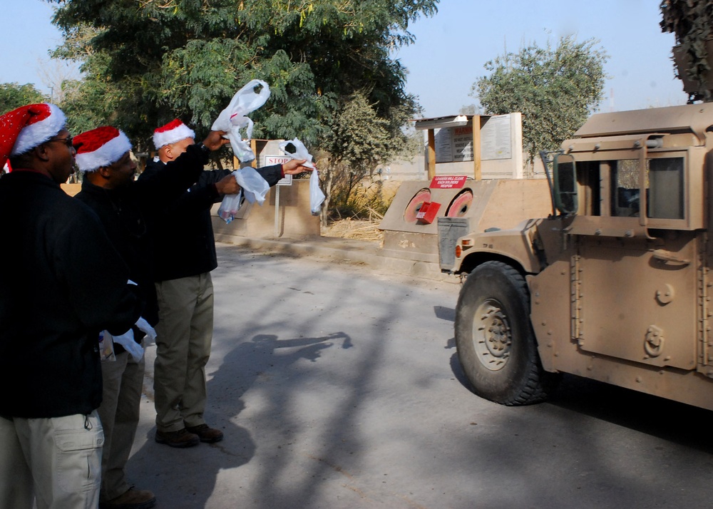 Contractors give back to Multi-National Division - Baghdad Soldiers on Christmas