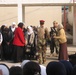 Soldiers provide assistance to girls of al-Nahareen school