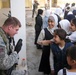 Soldiers provide assistance to girls of al-Nahareen school