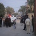 Iraqi police distribute candy, food in Andaloos precint