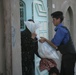 Iraqi police distribute candy, food in Andaloos precint