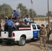 Iraqi police distribute blankets, heaters in Ramadi