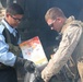 Iraqi police distribute blankets, heaters in Ramadi