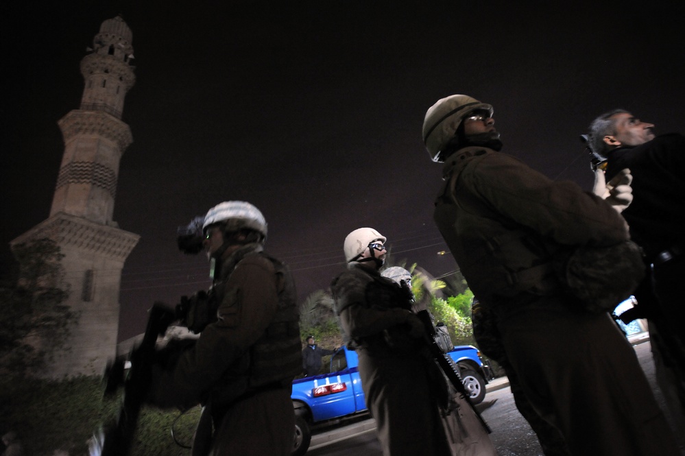 USAF Police patrol in Doura community