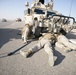 Security Marines change tire during mission