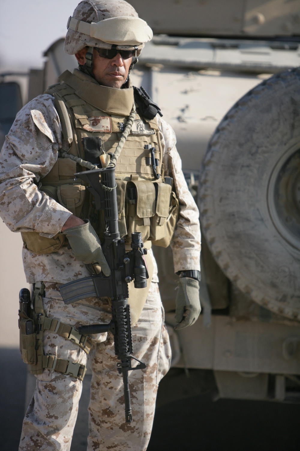 Security Marines change tire during mission