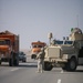 Security Marines change tire during mission