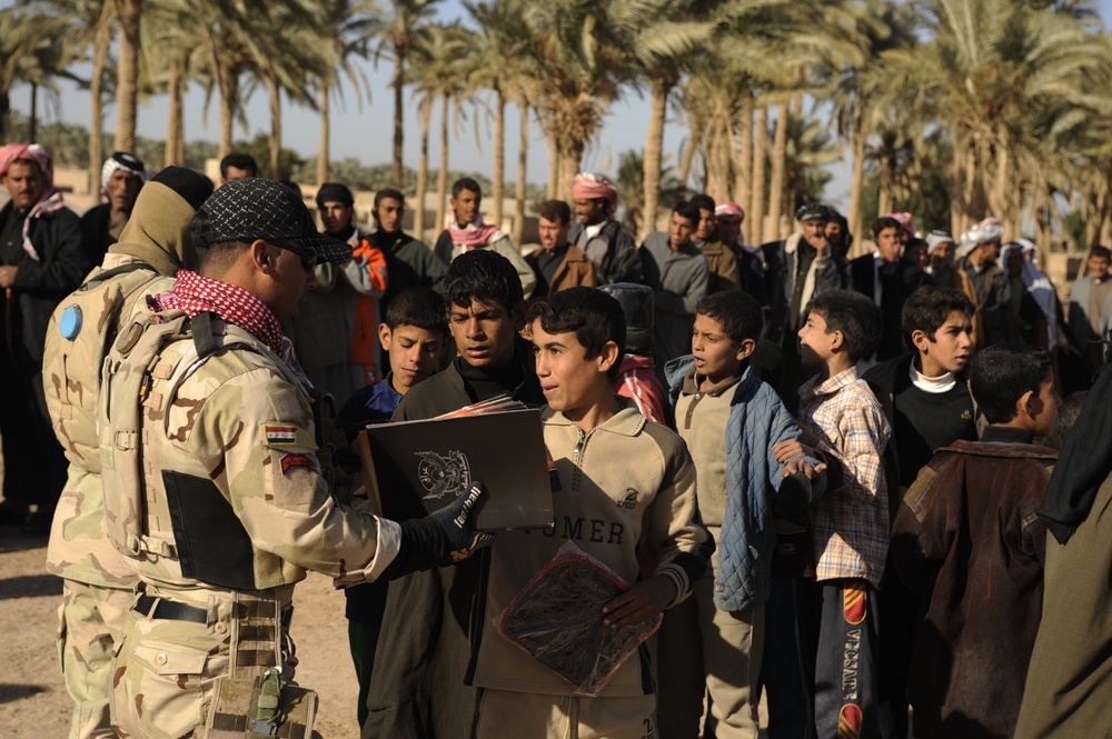 Meet with Sheiks and hand out supplies in Shinafiyah Iraq