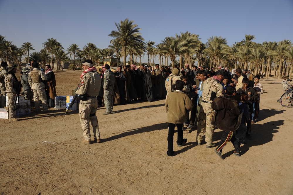 Meet with Sheiks and hand out supplies in Shinafiyah Iraq