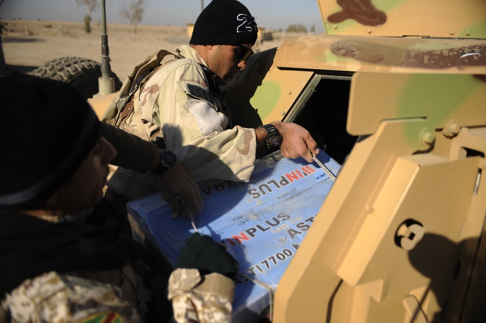 Meet with Sheiks and hand out supplies in Shinafiyah Iraq